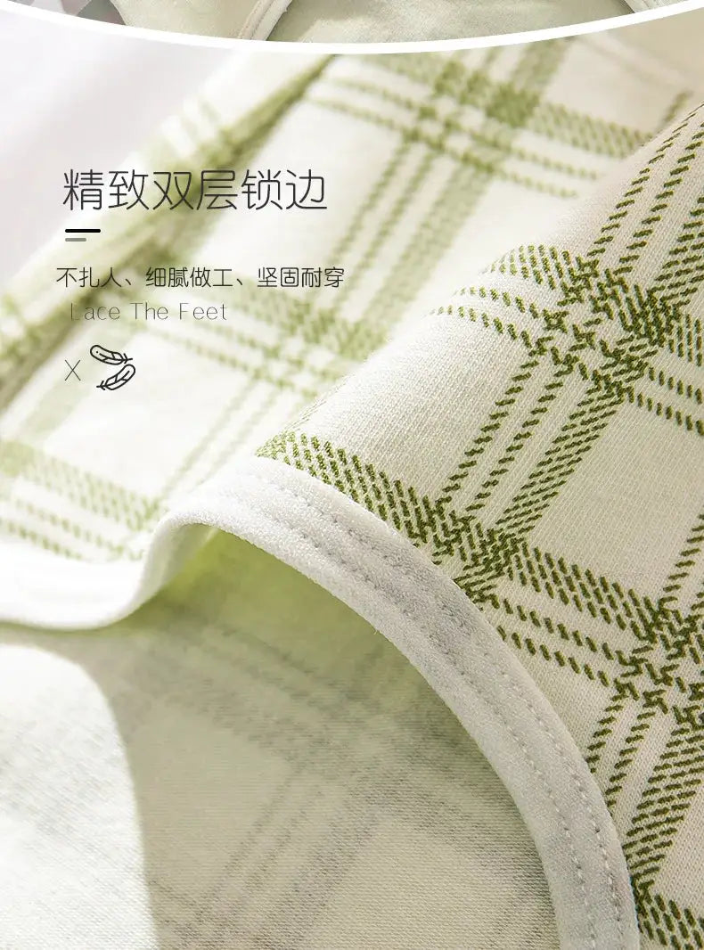 Women's cotton underwear lace briefs, high-waist seamless, green plaid fabric close-up.
