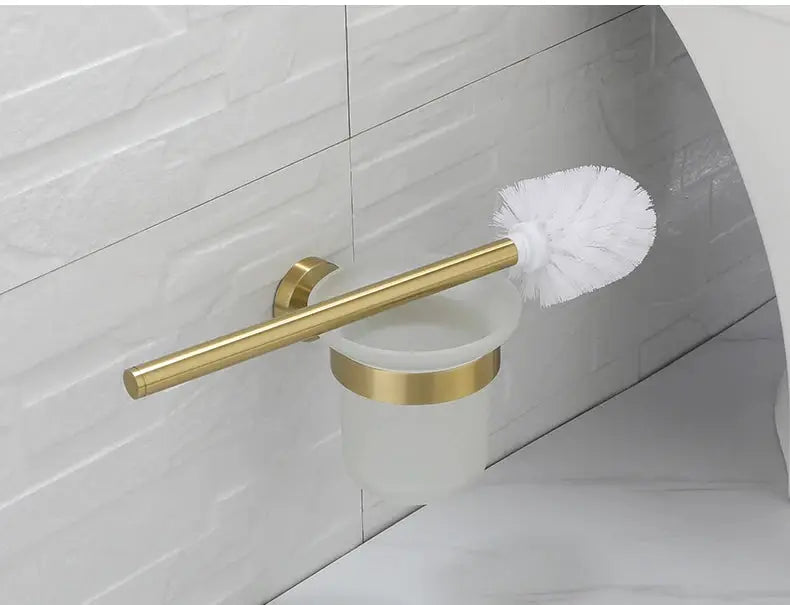 Brushed gold bathroom hardware set with wall-mounted toilet brush holder