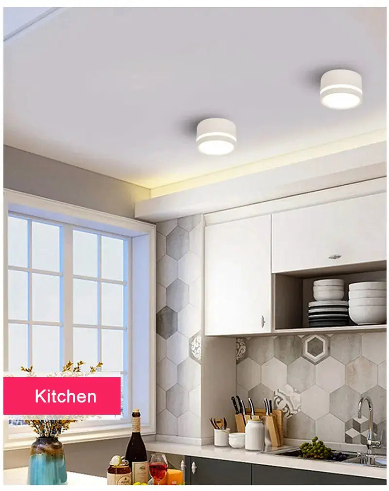 Simples Market LED surface-mounted downlights; two white circular ceiling fixtures in a kitchen.