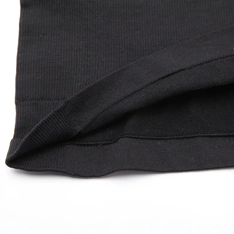 Simples Market men's black compression shirt with reinforced hem for abdomen shaping