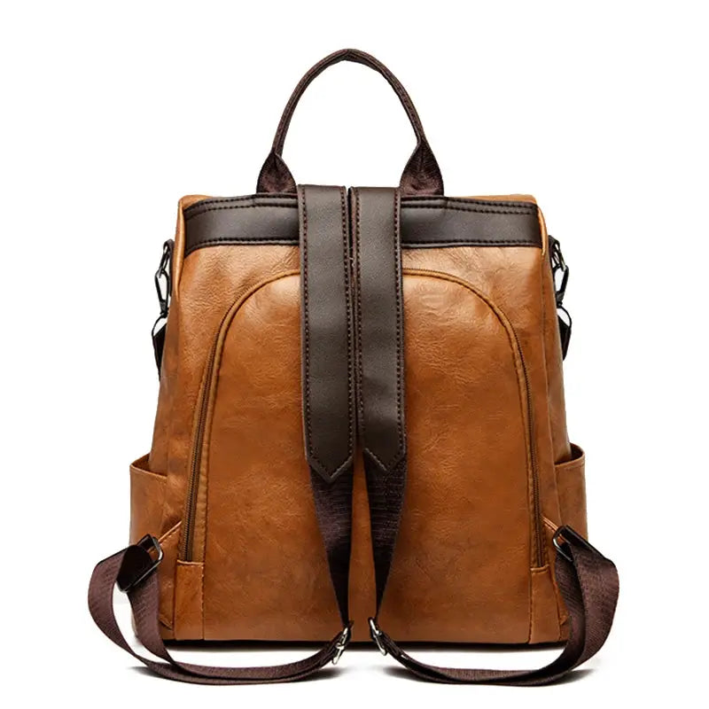 Backpack by Simples Market; brown PU leather anti-theft women's travel backpack with top handle, large capacity