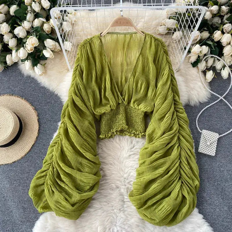 Green chiffon draped blouse with V-neck and puff long sleeves, cropped smocked waist for women
