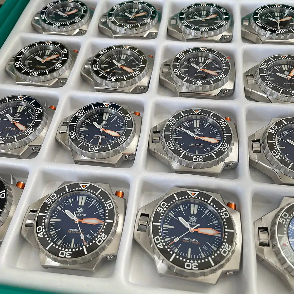 Steeldive Proplof SD1969 V3 dive watches, stainless steel 56mm, black dials with orange hands; 16 watches in tray