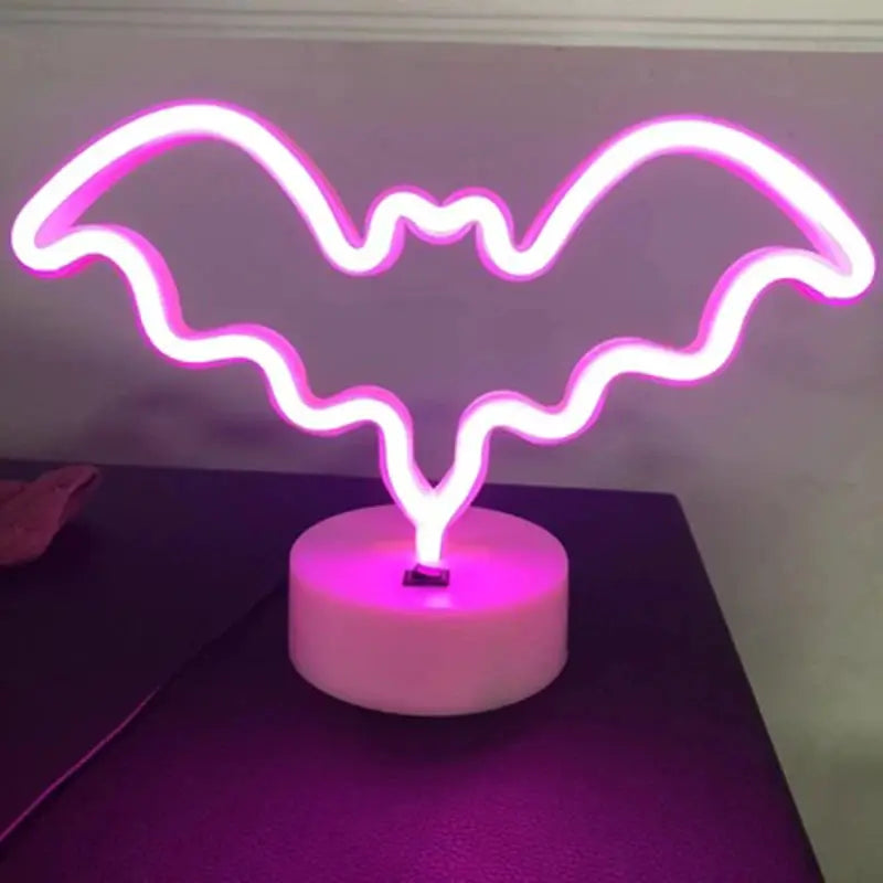 Neon Sign USB LED Decoration pink glow bat-wing lamp on white circular base by Simples Market