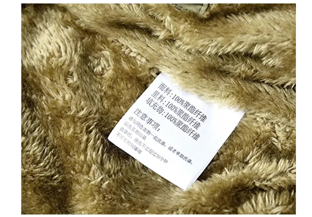 Winter men's fleece sleeveless vest with brown faux-fur lining; close-up of white care tag amid plush fabric
