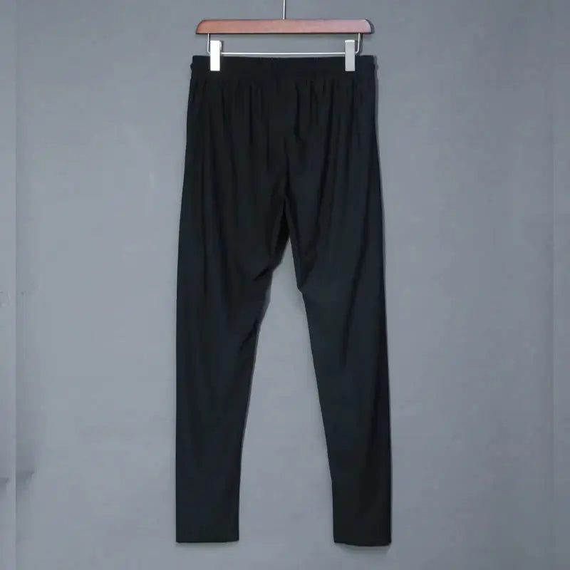 Men's black running pants with elastic waistband for training