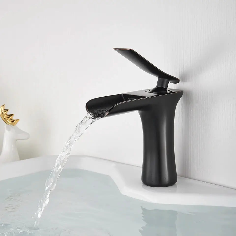 Basin faucet, matte black with antique brass trim, single-handle waterfall style for sink by Simples Market