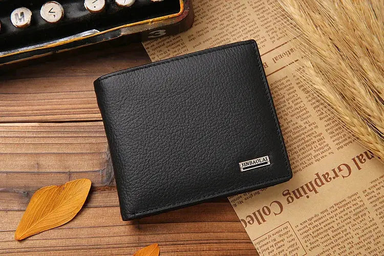 Black genuine leather men's wallet with coin pocket and card slots; metal brand badge.
