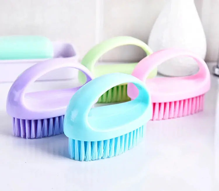 Egg-shaped cleaning brush set of 4 with soft bristles in blue, lavender, pink, and green