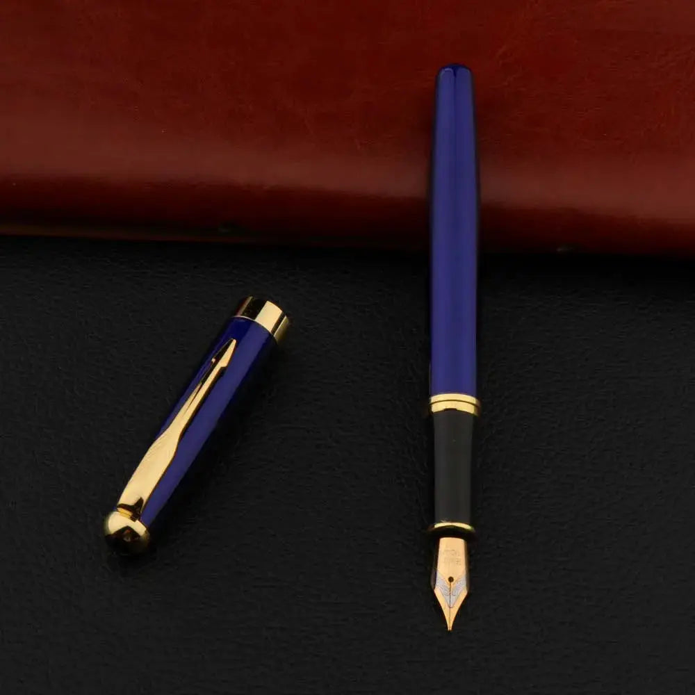 Blue metal fountain pen by Simples Market with gold trim and visible nib.