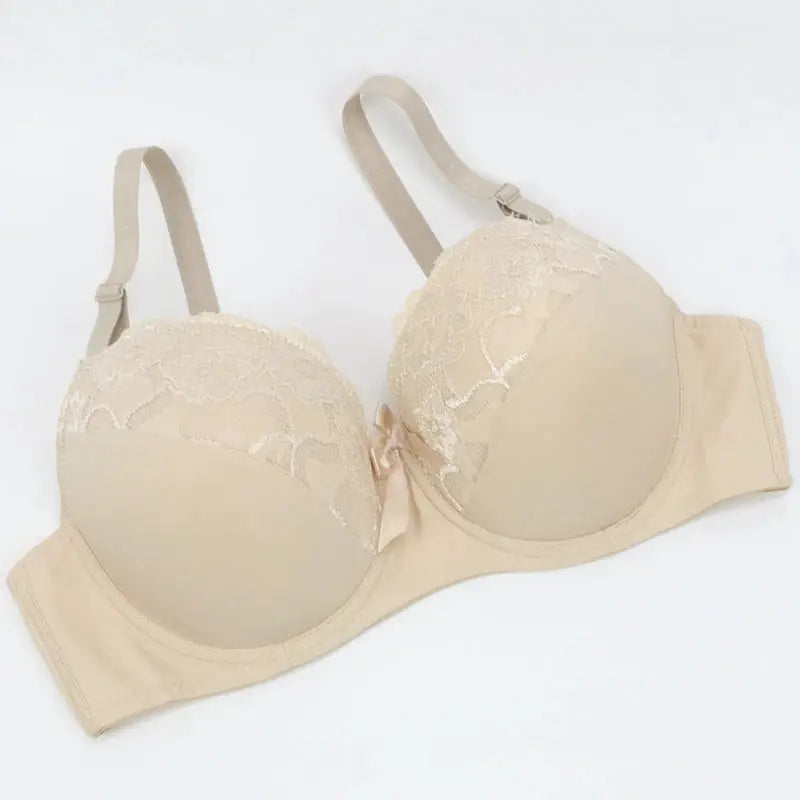 Beige lace push-up underwire bra by Simples Market with floral embroidery