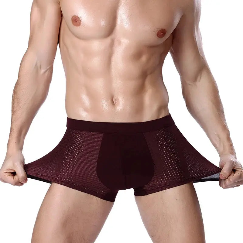 Men's bamboo-fiber boxer briefs in burgundy with mesh panels by Simples Market.