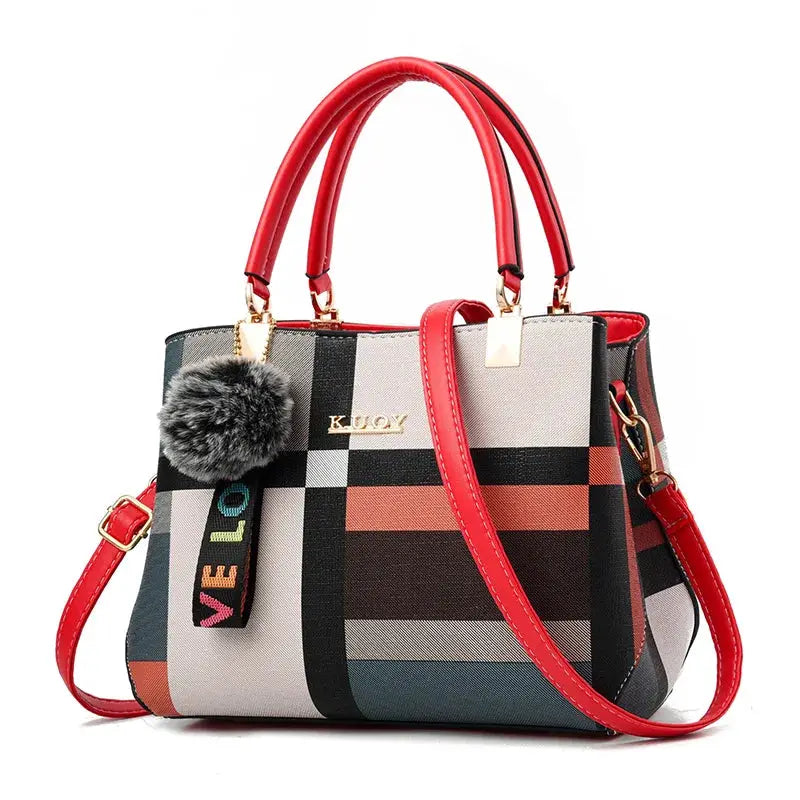 Crossbody designer handbag in multicolor plaid PU leather with red handles and fur pom-pom by Simples Market