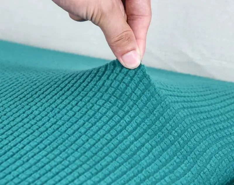 Sofa seat cushion cover by Simples Market in teal ribbed stretch fabric, washable removable slipcover.