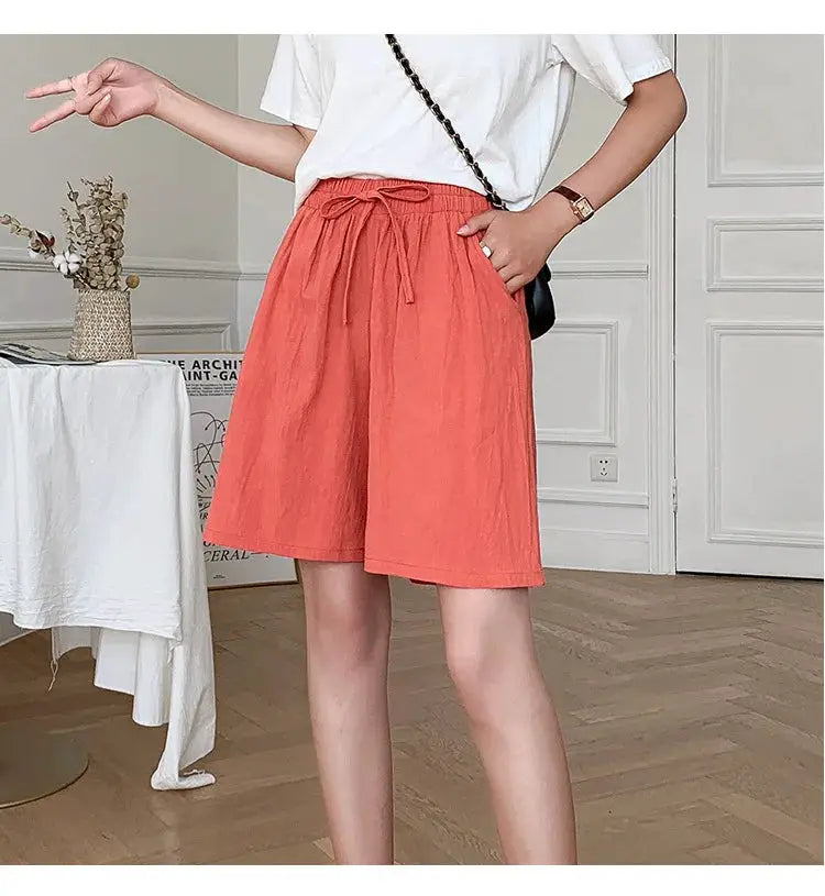 Women's cotton shorts by Simples Market, coral high-waist loose shorts with drawstring and two pockets