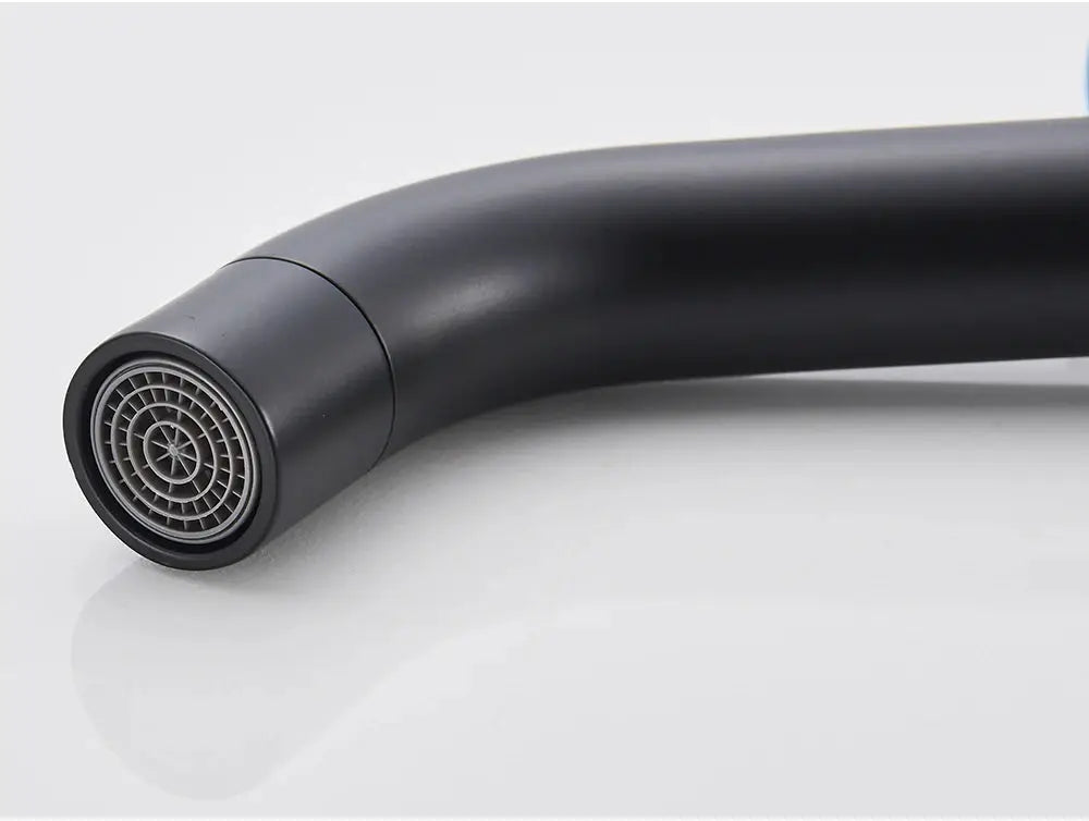 Black basin faucet with curved spout and aerator end