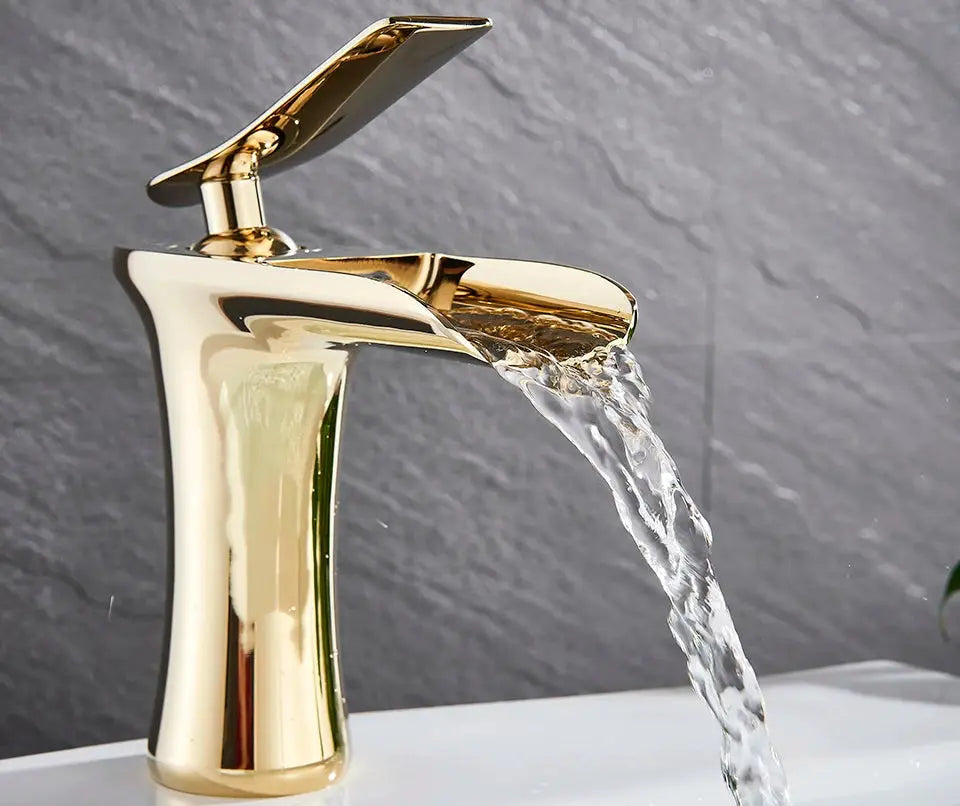 Antique brass waterfall basin faucet with single-handle by Simples Market