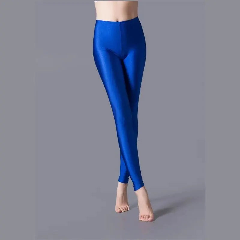Women's shiny blue pant leggings by Simples Market; stretchy fluorescent spandex fabric.