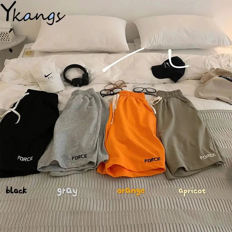Women's drawstring shorts in four colors (black, gray, orange, apricot) with FORCE logo; casual vacation wear.