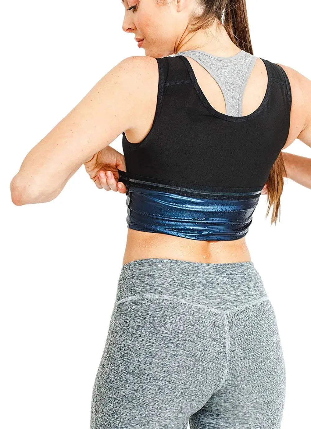 Neoprene waist trainer belt in metallic blue worn over a black athletic tank top