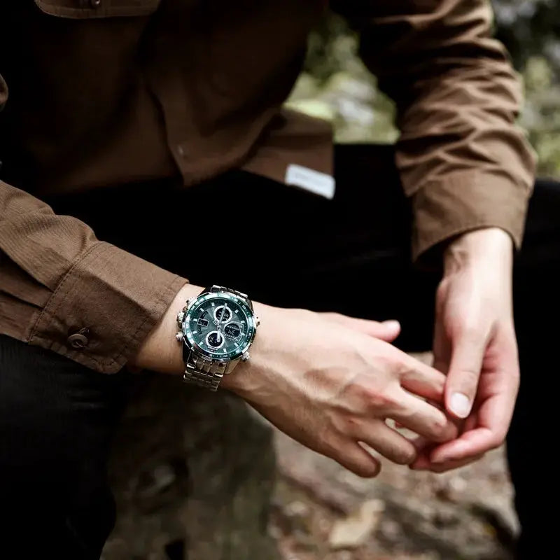 Naviforce men's stainless steel watch with green dial and chronograph subdials.