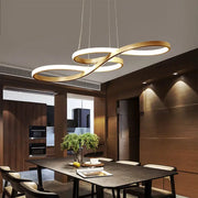 Modern kitchen island pendant light by Simples Market with gold and white rings and remote dimming over dining table