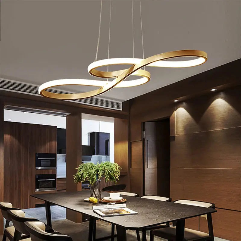 Modern kitchen island pendant light by Simples Market with gold and white rings and remote dimming over dining table