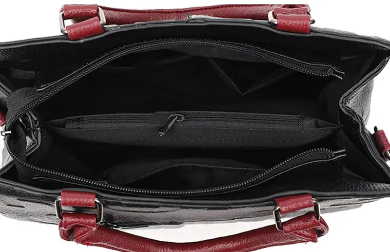 PU leather crossbody bag for women by Simples Market, black with red handles, large-capacity tote with inner pockets.