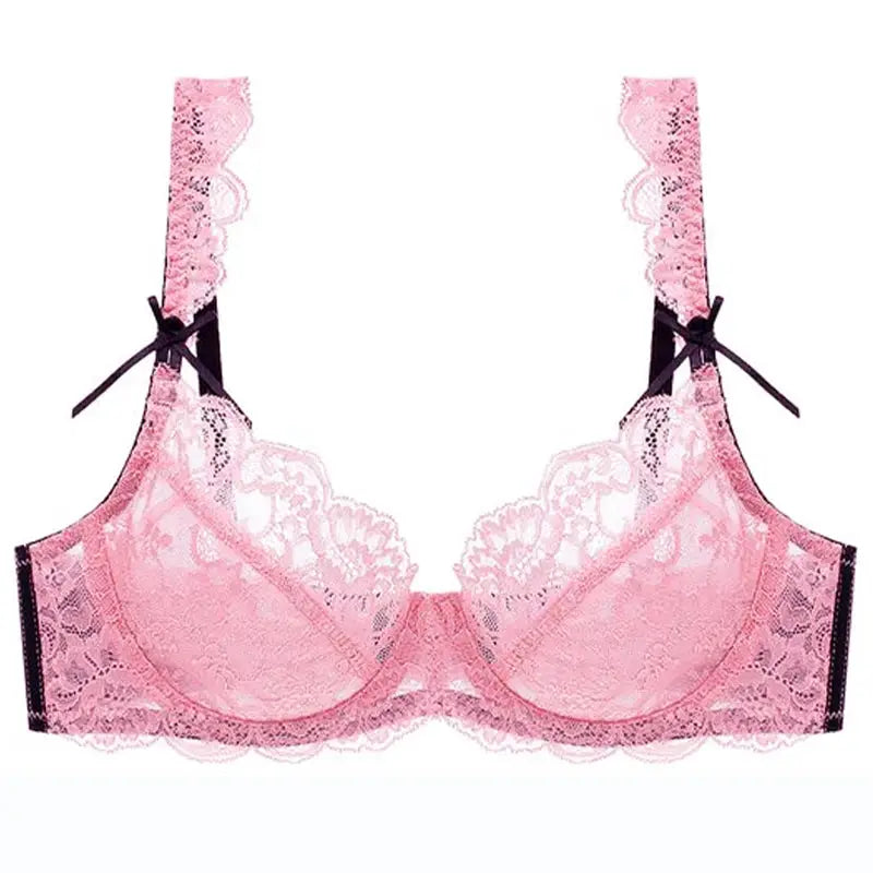 Pink lace bra by Simples Market with mesh cups and black ribbon bows