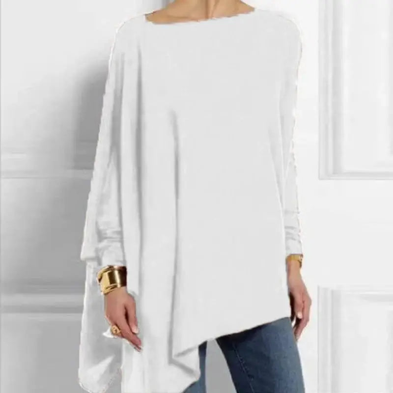 White cotton irregular women's blouse with long sleeves, round neck and asymmetric hem