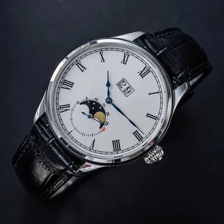 Sugess Tianjin ST25 moonphase men’s watch with white dial, Roman numerals, blue hands, date window, black leather strap