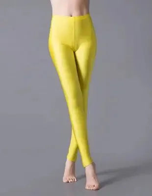 Women's shiny leggings in bright fluorescent yellow spandex