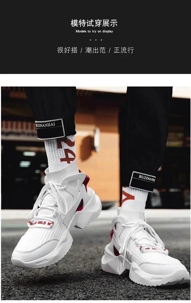 Pair of white men's sneakers with chunky sole and breathable knit upper, lace-up running style