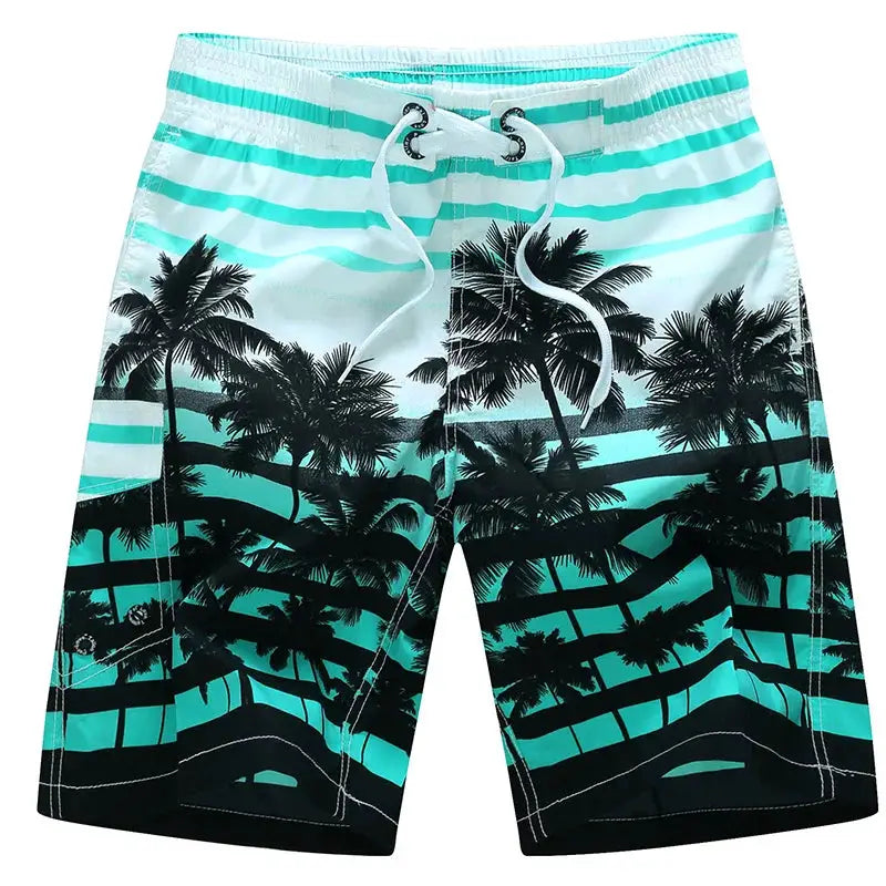 Men's surf board shorts with turquoise palm tree print and white drawstring waistband
