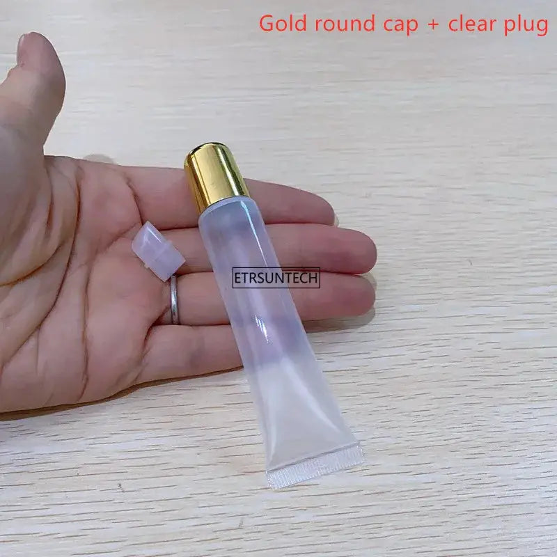 Clear lip gloss tube with gold cap; empty squeeze bottle, ETRSUNTECH brand (Simples Market)