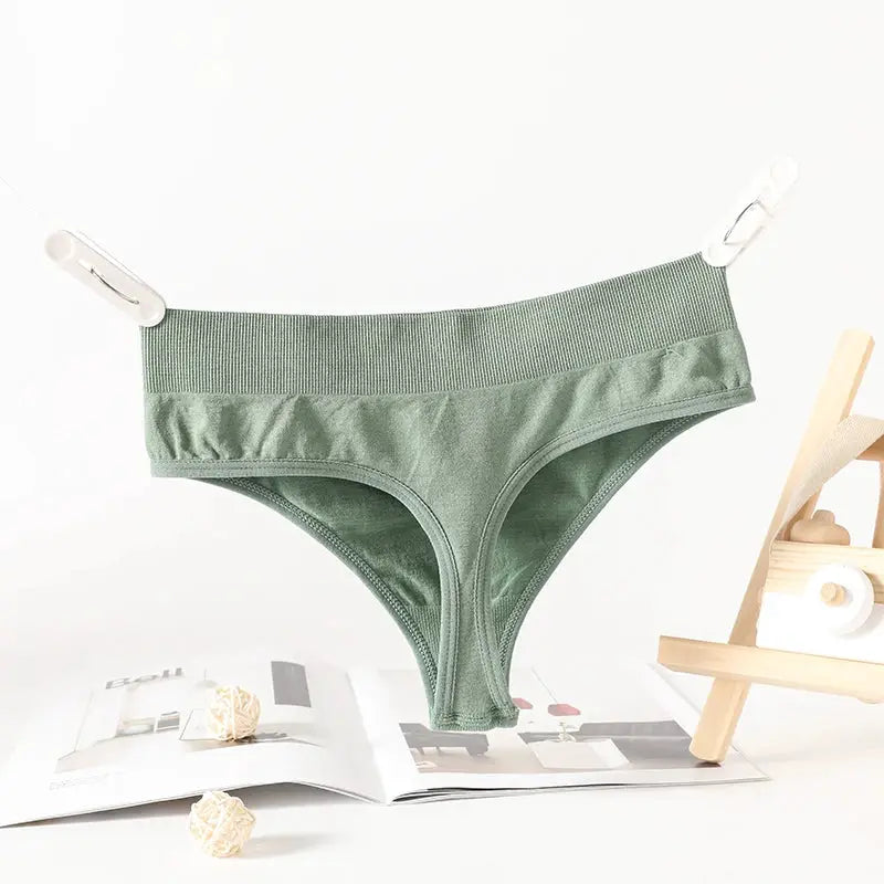 Simples Market ribbed green thong underwear, high-rise waistband, G-string cut.