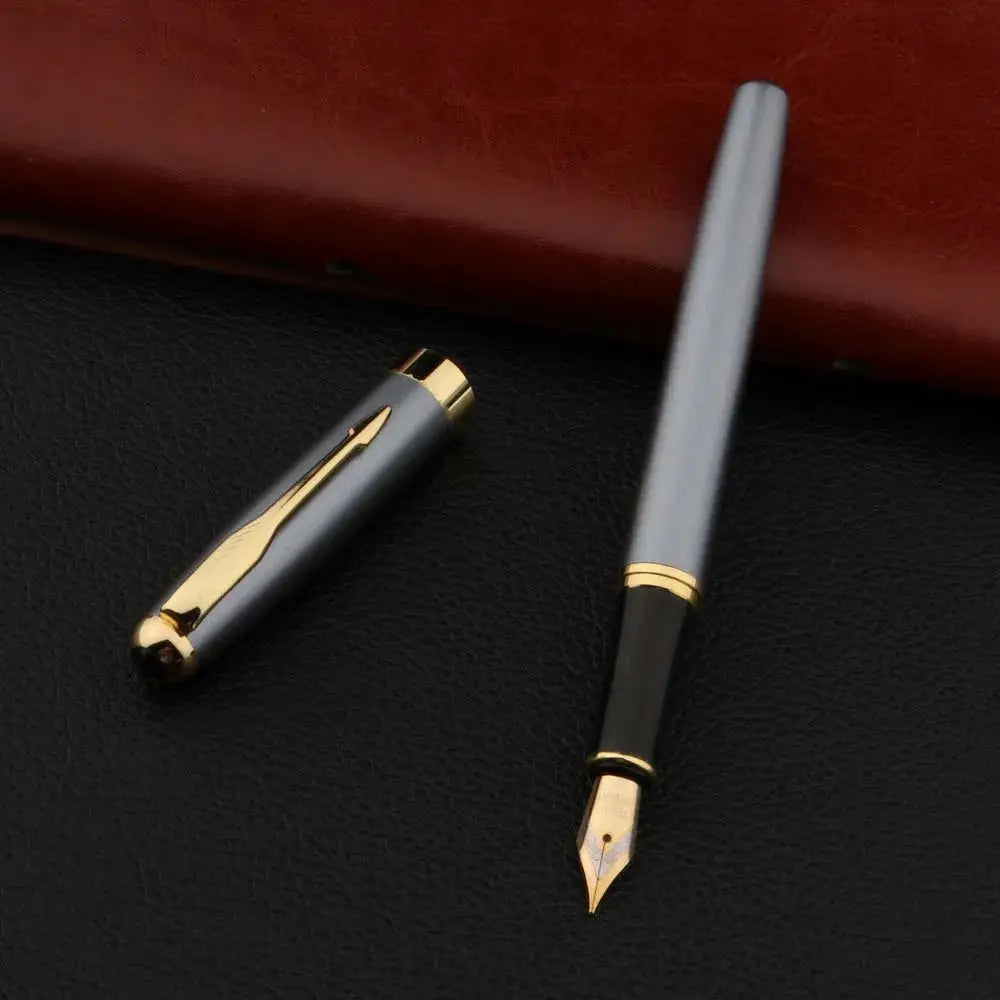 Simples Market metal fountain pen, grey body with gold trim and nib; cap separated (2-piece set)