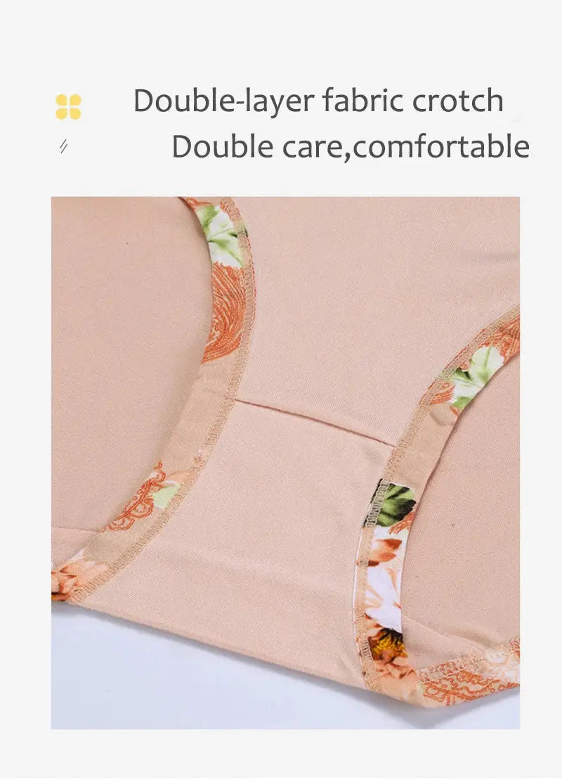 Plus-size floral briefs in nude fabric with colorful floral trim