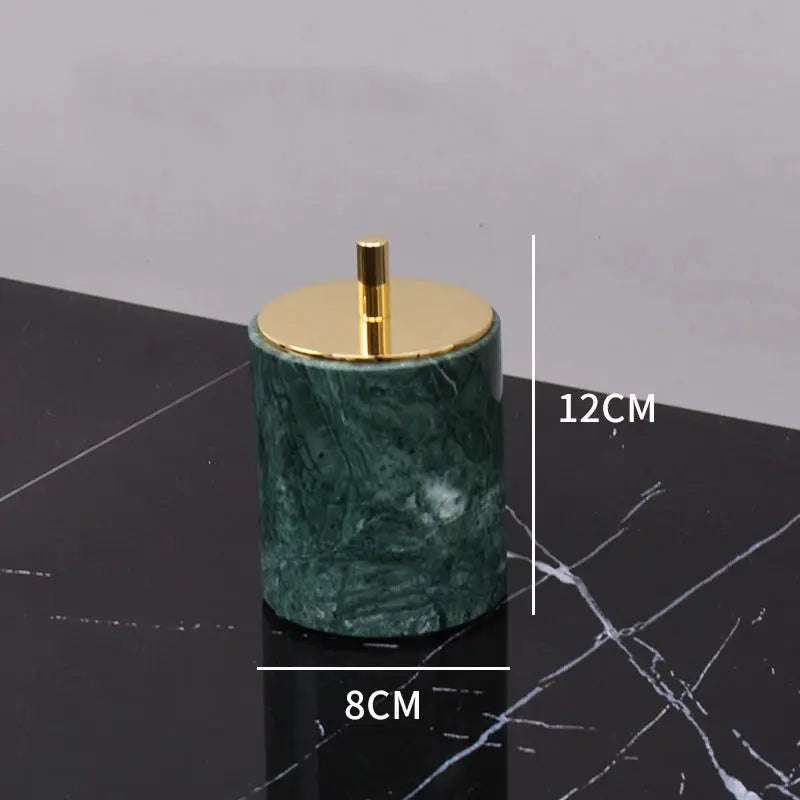 Soap dispenser in green Indian marble with a gold pump; 12 cm tall, 8 cm diameter.
