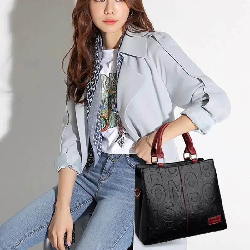 PU leather crossbody bag for women, black with red top handles