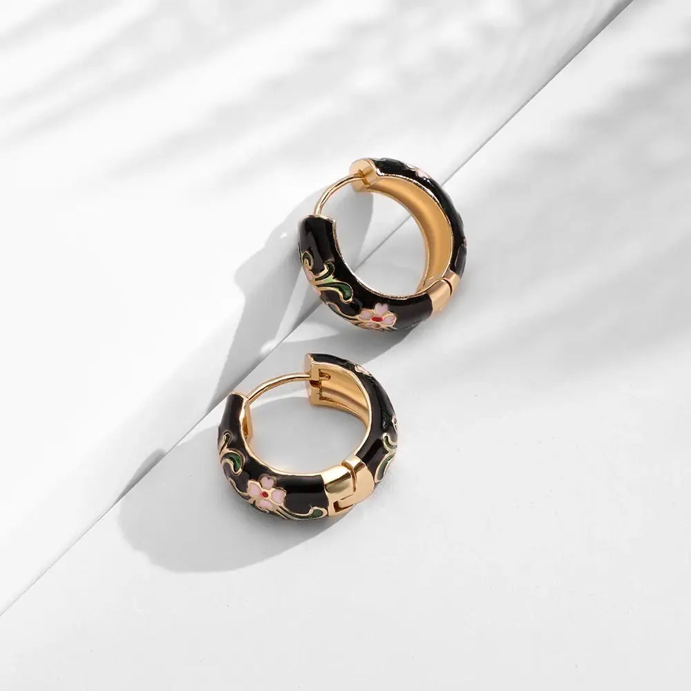 Simples Market enamel flower hoop earrings, black with gold-tone trim and pink floral accents