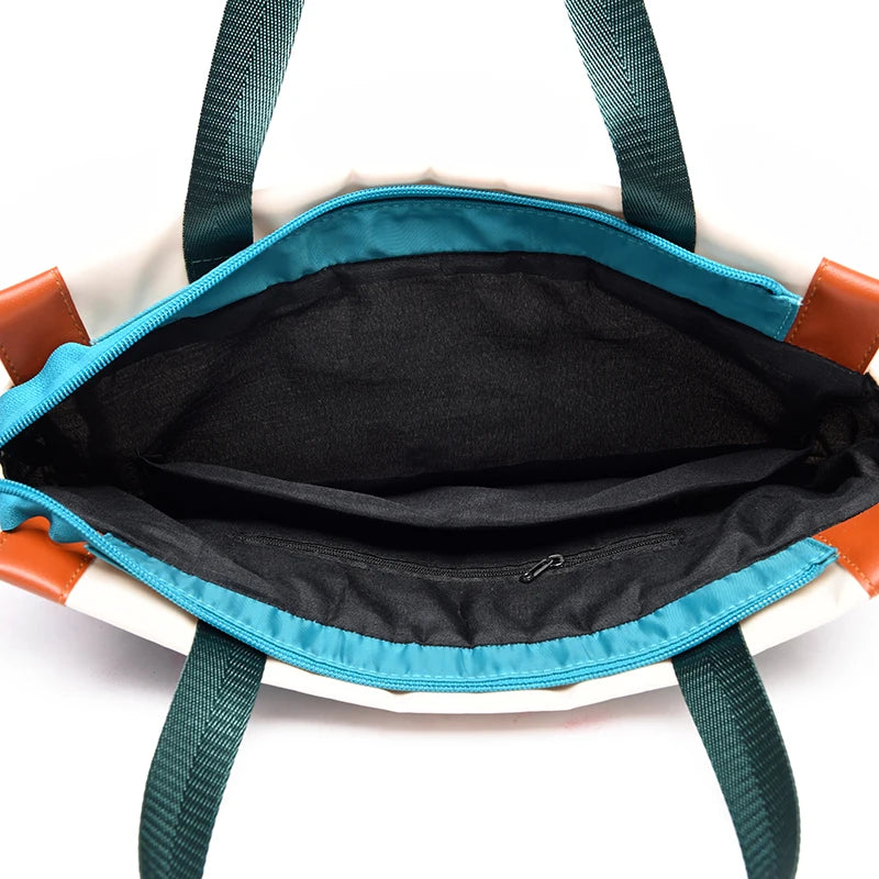 Simples Market women's waterproof Oxford backpack, turquoise trim with teal straps, open main compartment