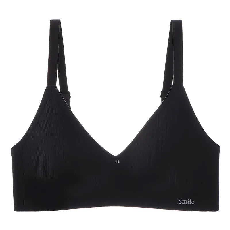 Black latex-cup bra with soft straps; skin-friendly, close-fitting, Smile logo, Simples Market.