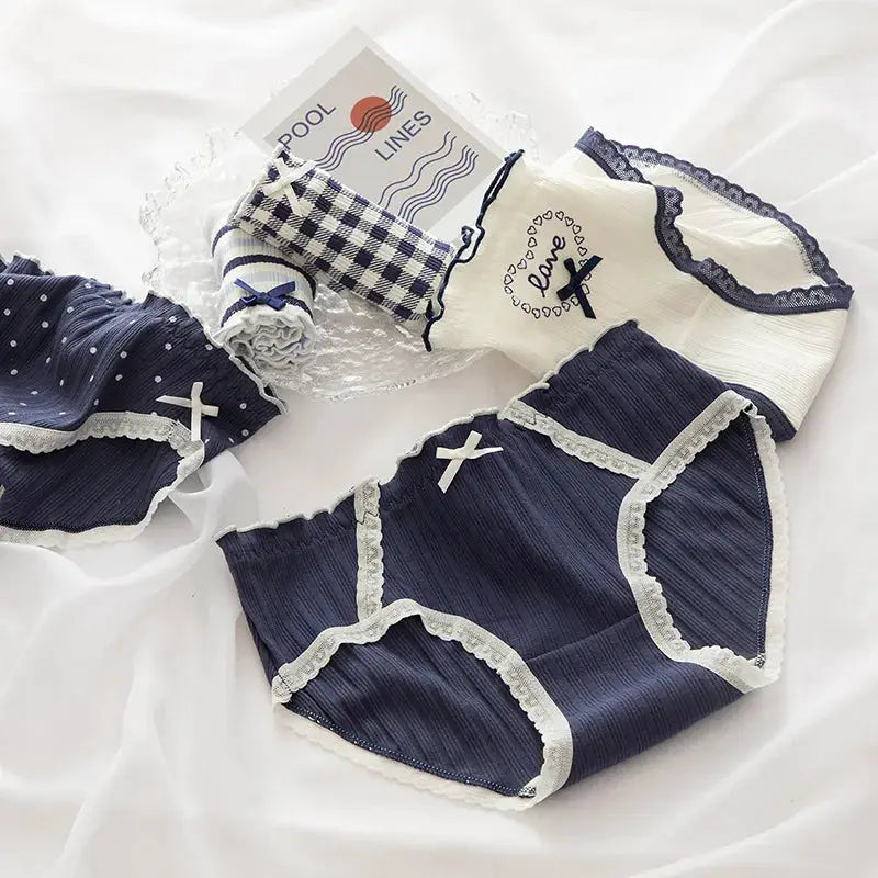 Cotton women's underwear set: navy mid-rise panties with white lace trim and bow