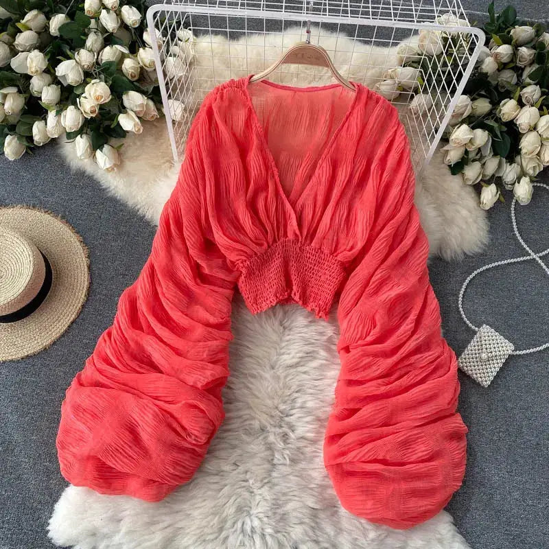 Simples Market red chiffon draped blouse for women with V-neck and puff long sleeves, cropped smocked waist.