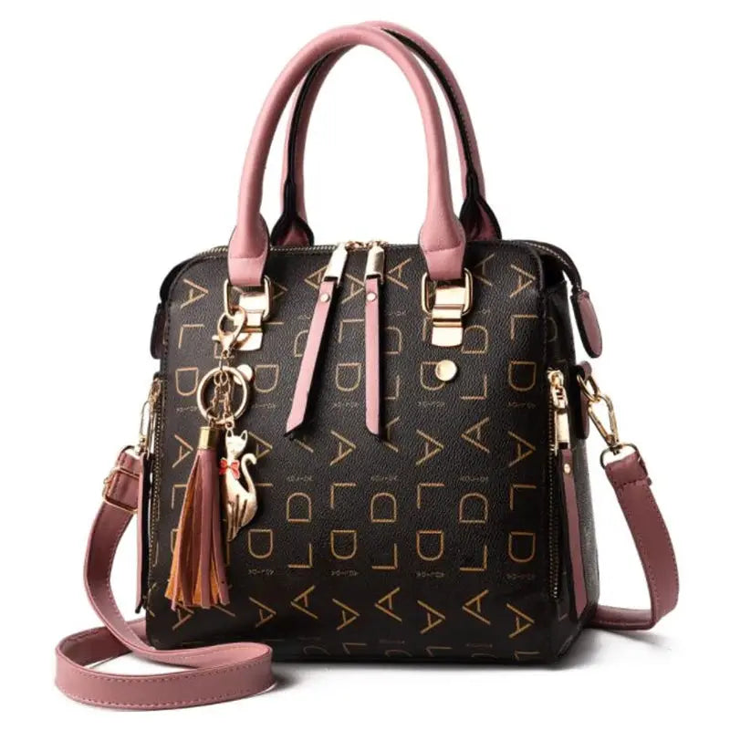 Fashion English Letter Handbag PU leather, black with pink top handles and tassel charm