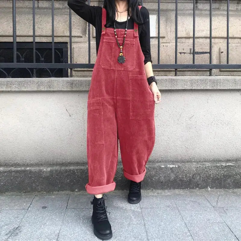 Corduroy overalls for women in red with suspenders and rolled cuffs