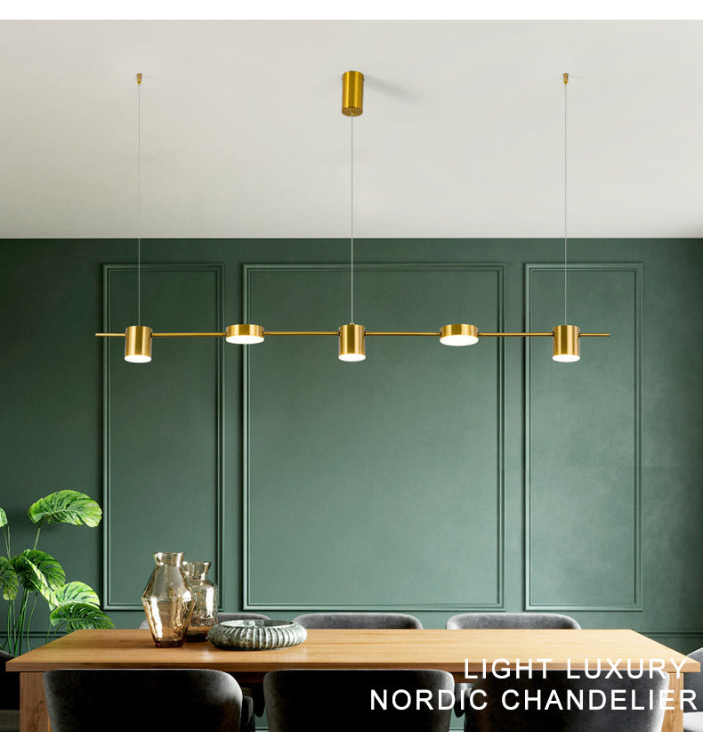 Modern LED linear dining chandelier with five gold cylindrical lights, dimmable indoor ceiling fixture.