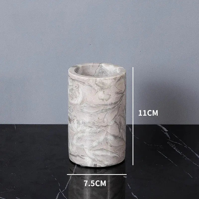 Marble bathroom cup, natural stone finish, 11 cm tall, 7.5 cm diameter.