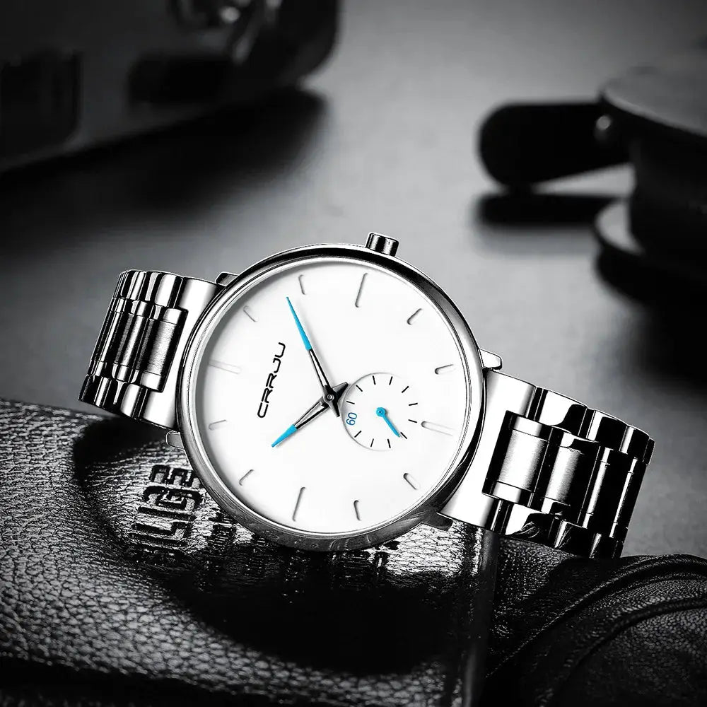 CRRJU men's stainless steel watch with white dial and blue hands on a metal bracelet